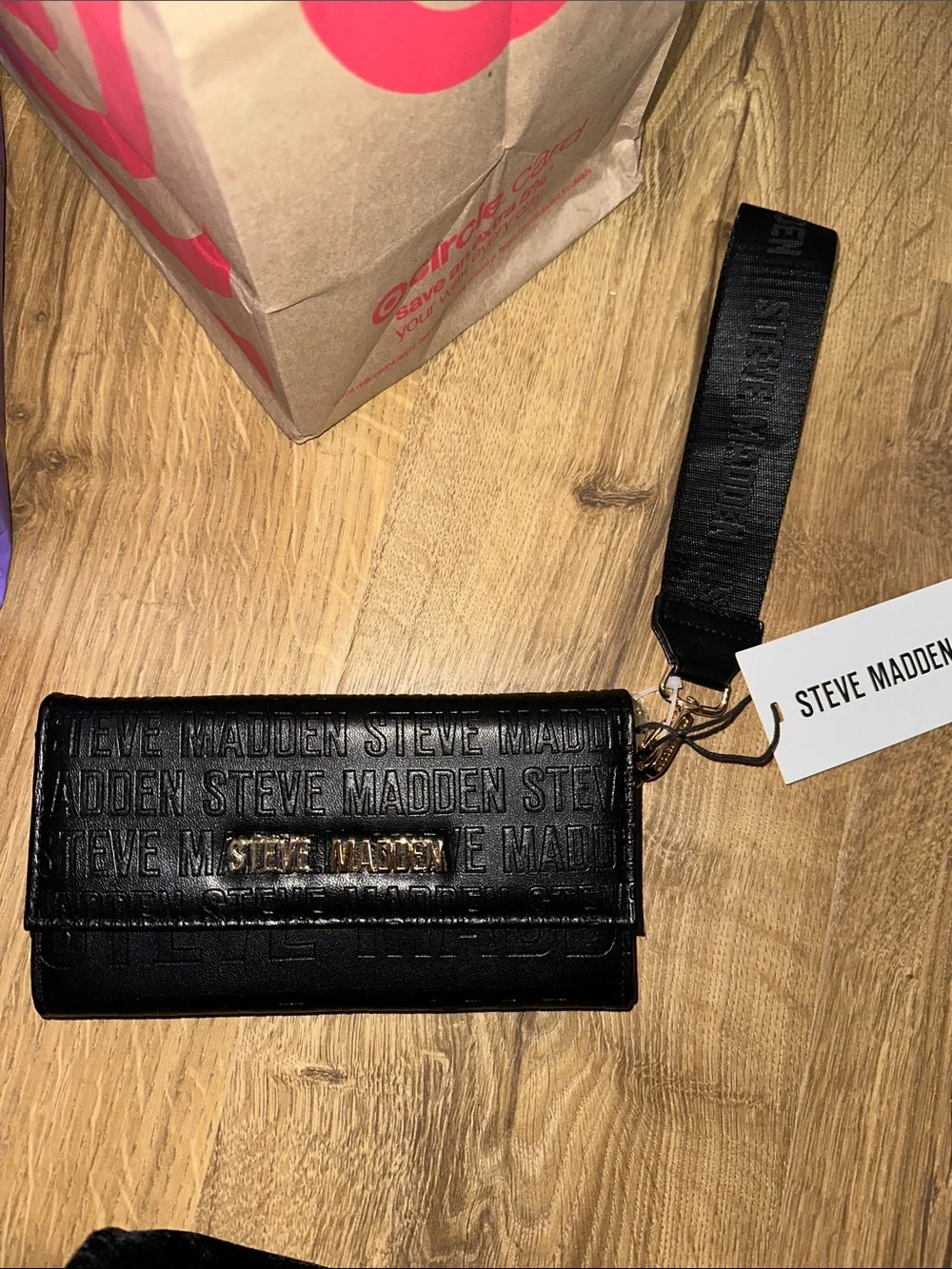 Steve Madden embossed logo print wristlet wallet
